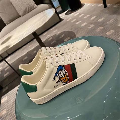 gucci sneakers donald dog|Gucci disney donald duck shoes.